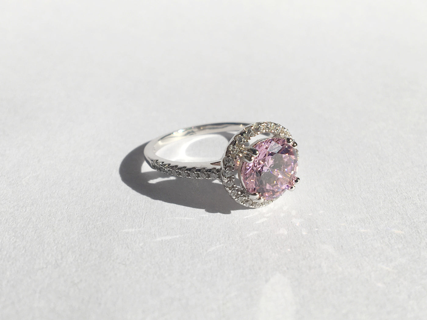 Round Cut Sterling Silver "Eve" Ring with Halo Setting in Pink